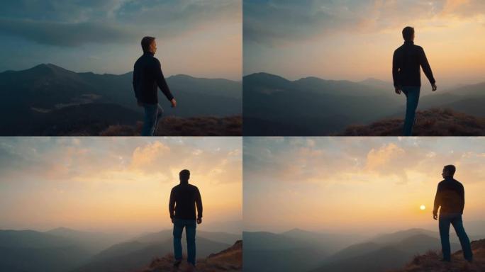 在夕阳背景下站在山上的男人