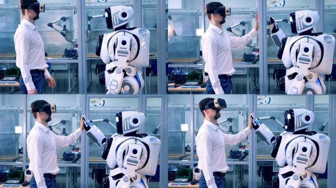 一位戴着VR眼镜的人给机器人击掌。