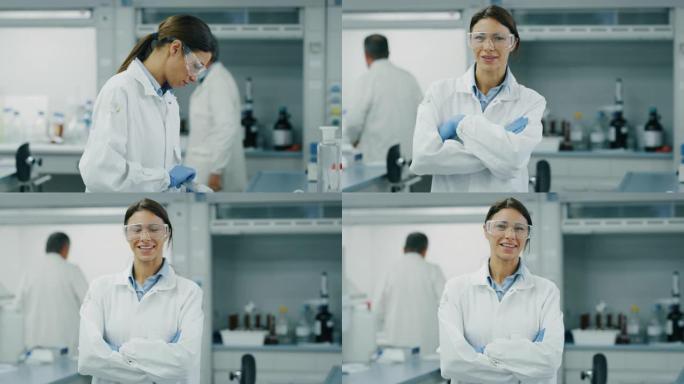 女科学家的肖像在实验室用平板电脑分析试管中的DNA和分子并显示结果。