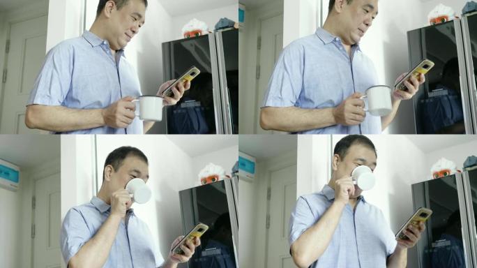 韩国男子在厨房使用手机