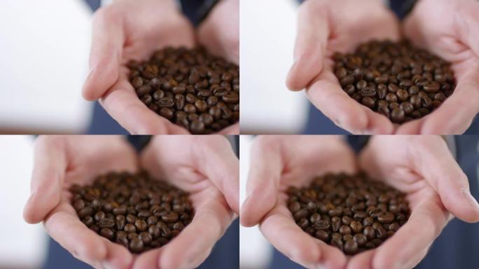 关闭少量咖啡豆手捧咖啡豆咖啡豆特写咖啡豆