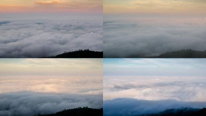 日出和多云移动的薄雾时间流逝在美丽的天空的山上自然，缩小运动