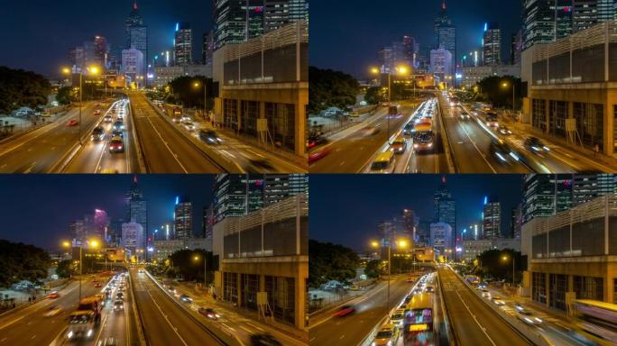 延时: 中环及金钟香港公路的夜间交通，背景为天际线建筑城市景观