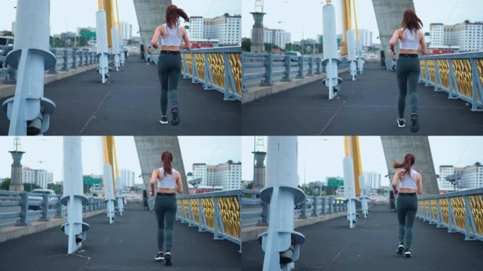 年轻女子慢跑过桥，慢动作