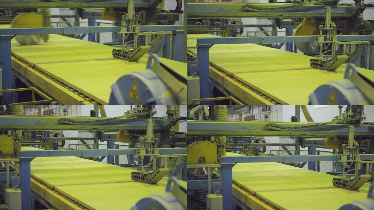 在生产线上切成板坯的硬化矿棉