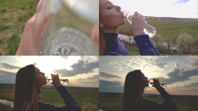 这位年轻女子正在户外从瓶子里喝水。慢动作