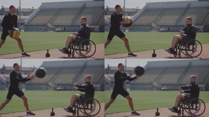 轮椅运动员和教练投掷药球