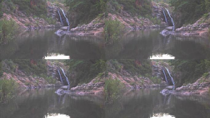 瀑布流入河流山间瀑布流动的水河流