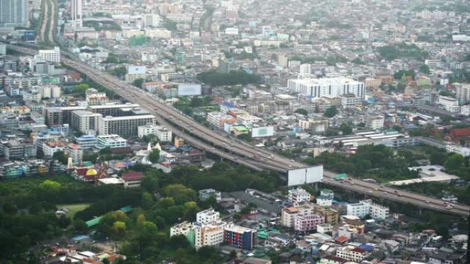 4k镜头场景曼谷高架城市景观高速公路，早上有交通交叉口和道路，交通与城市景观概念