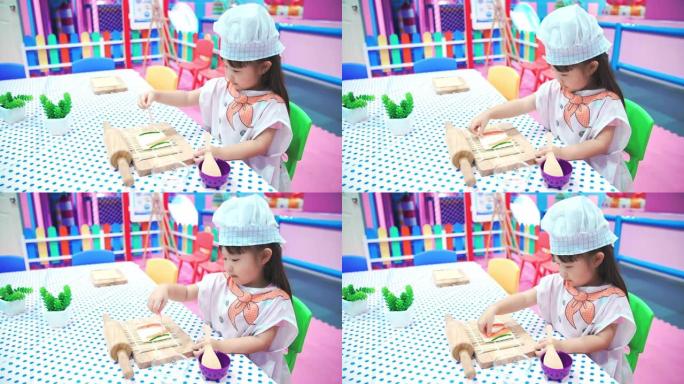 小女孩学习做寿司