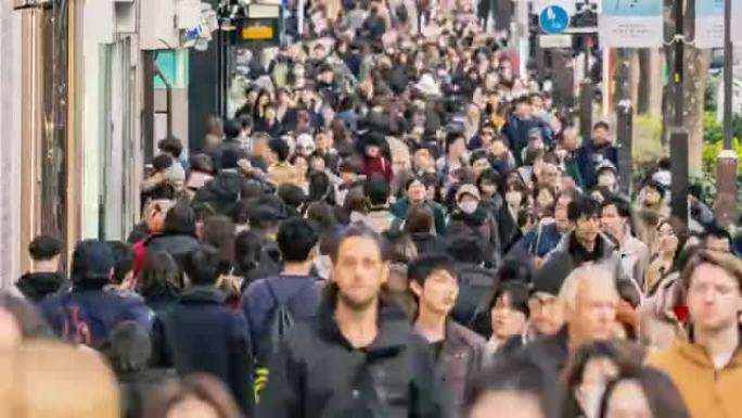4k延时一群未定义的人阻止了在日本东京市原宿时尚购物中心周围的街道上行走的行动自由。日本文化与拥挤观