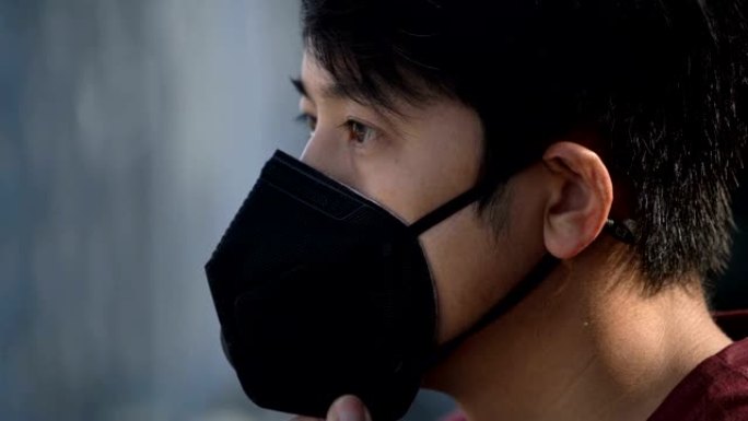 CU SLOMO-亚洲男子戴污染面具
