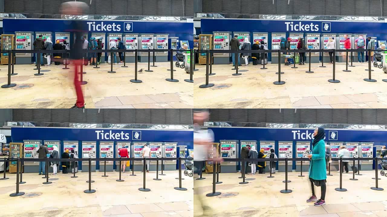 英国苏格兰格拉斯哥火车站售票厅的延时步行通勤人群