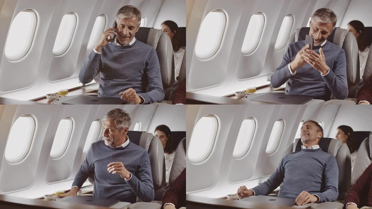 商人在私人飞机上用手机聊天