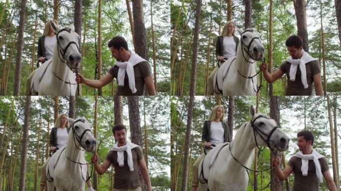 骑着白马穿过森林的女人