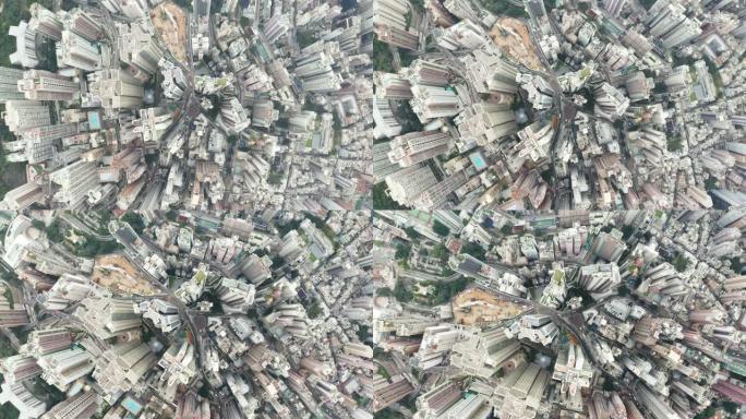 从无人机上鸟瞰香港城市景观。香港城市无人机90度鸟瞰图。相机从上到下旋转。