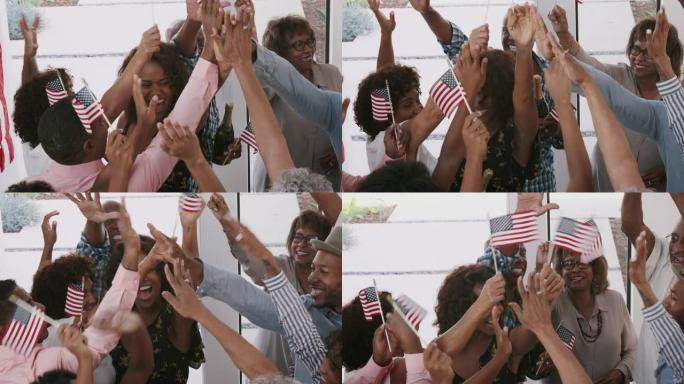 黑人家庭与亲戚一起庆祝独立日高五，近距离观看
