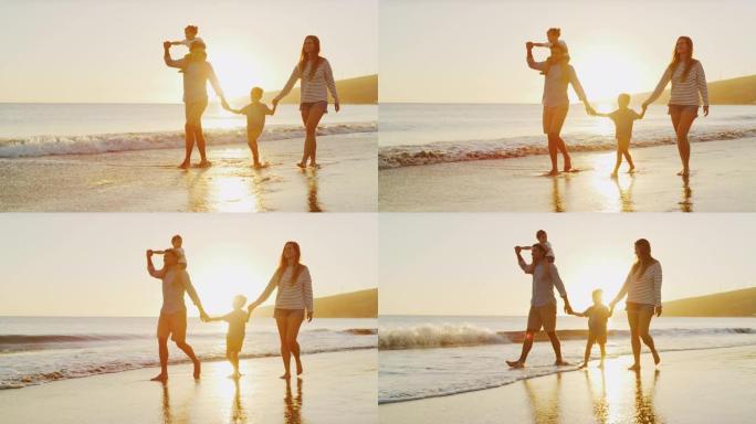 妈妈和爸爸在海滩上挥舞着儿子