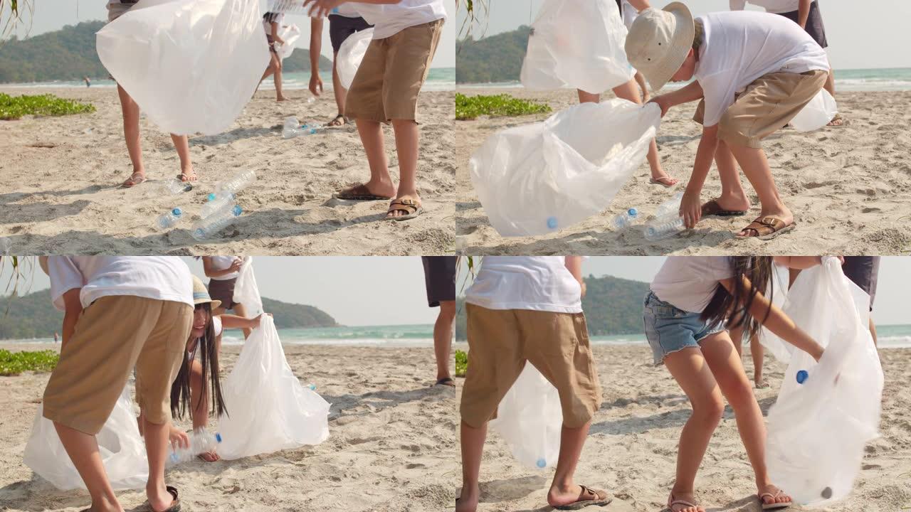 亚洲年轻幸福家庭活动家在海滩上收集塑料垃圾。