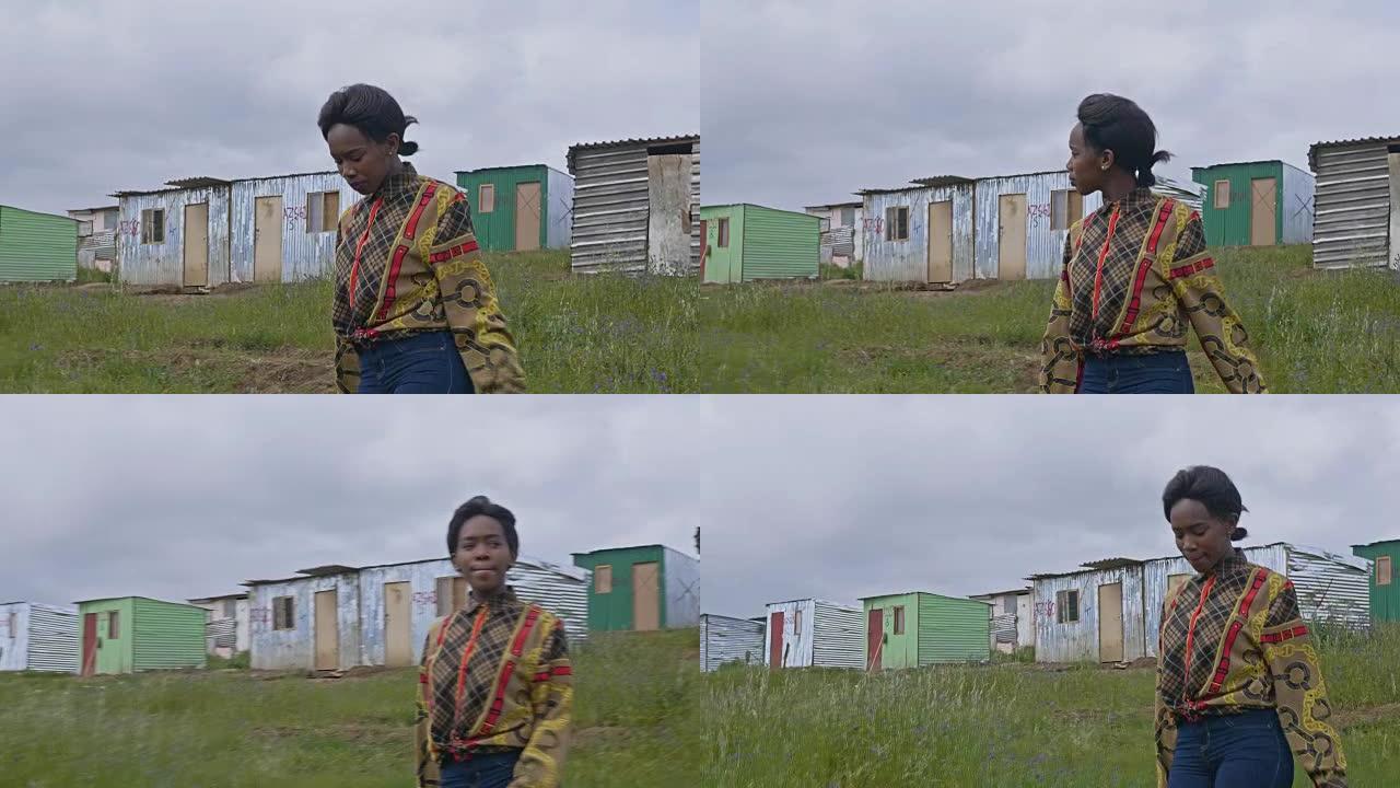 南非一名年轻黑人妇女在小镇行走的实时视频