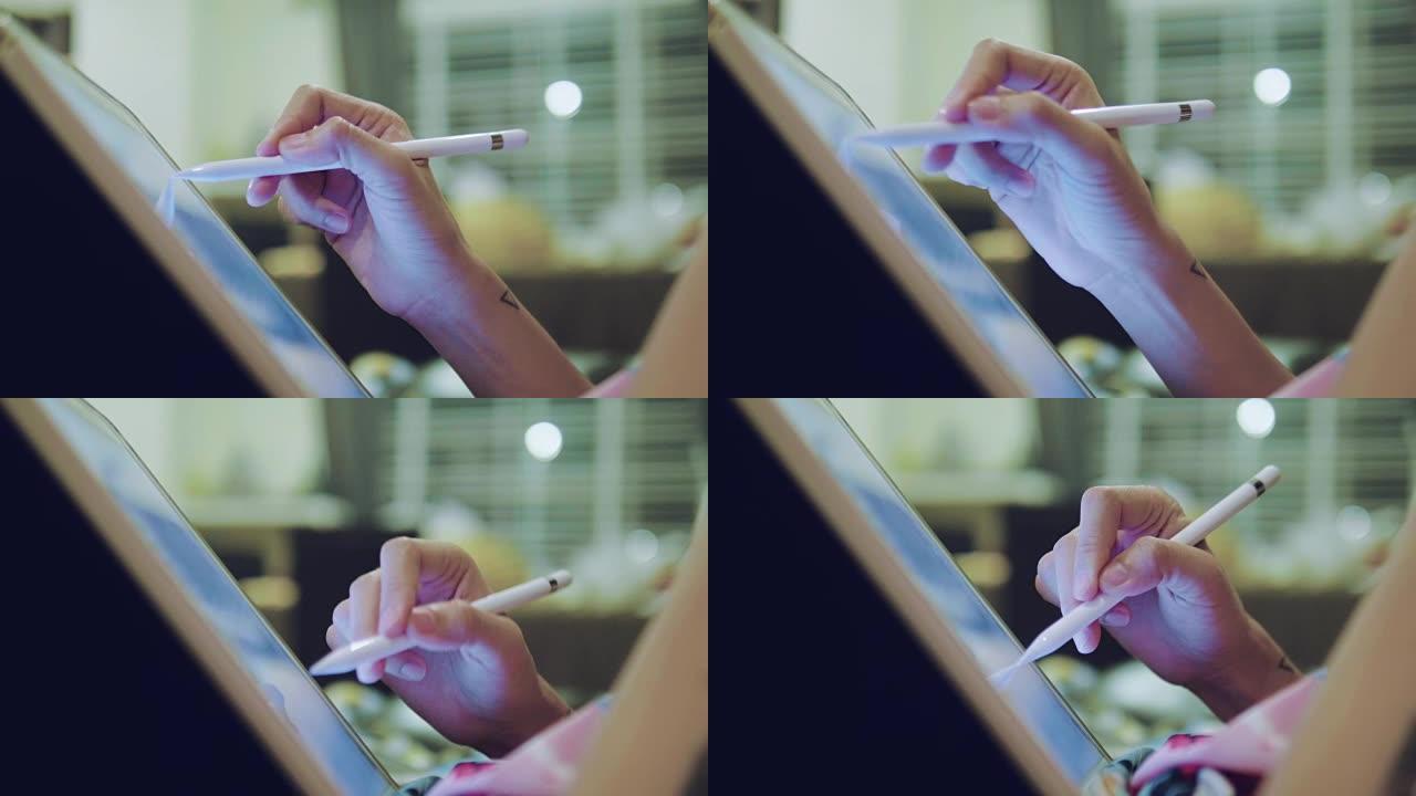 亚洲设计师女性在平板电脑上画了一幅画