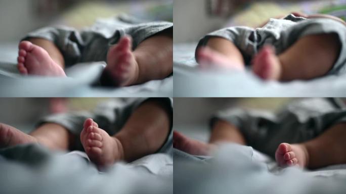 关注亚洲华裔男婴在床上的腿