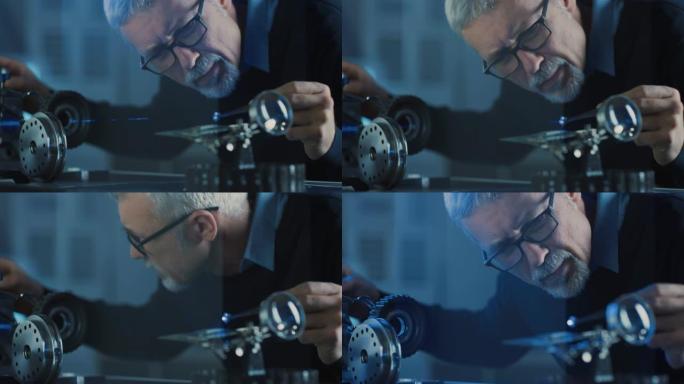 聚焦中年工程师的特写肖像在眼镜中使用高精度激光设备，使用透镜和测试光学器件以获得所需的精度电子设备