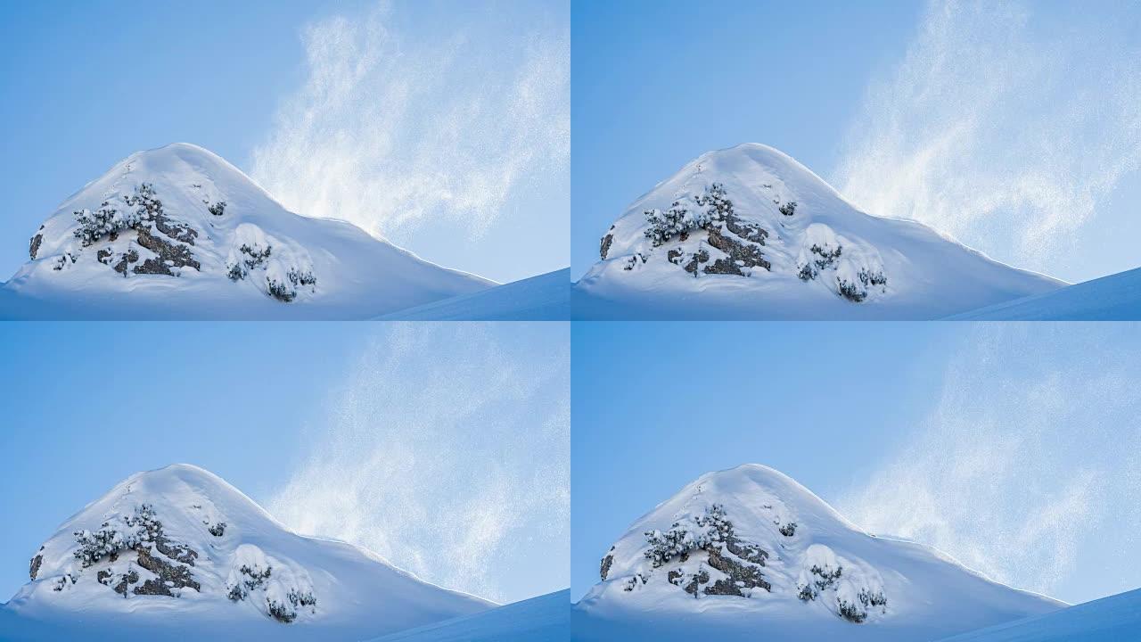 风吹过白雪皑皑的山峰