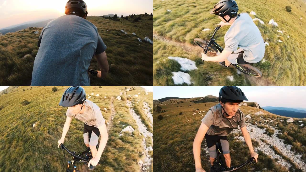 男性运动员山地自行车在山区的草地上骑自行车