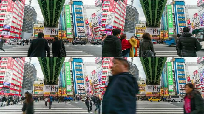 4k时间流逝的人群步行立交桥在日本秋叶原东京市的街道交叉路口与汽车交通交叉路口。日本文化与电城购物区