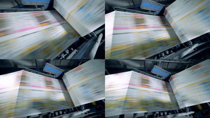 印刷输送机在排版设施中移动报纸。