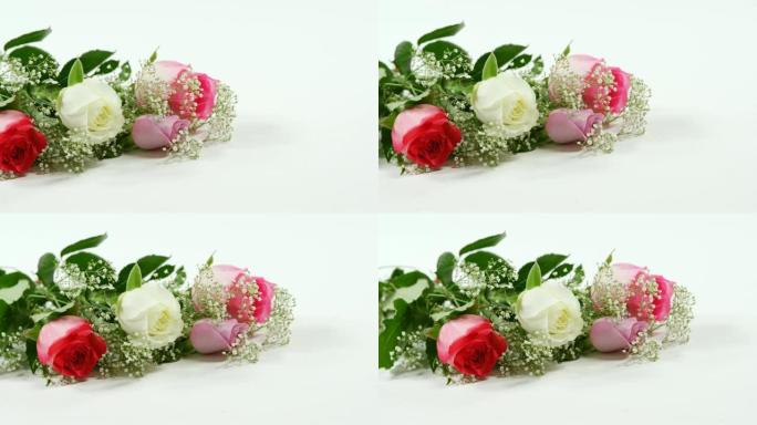 白色背景上的红色，白色和粉红色玫瑰花束4k