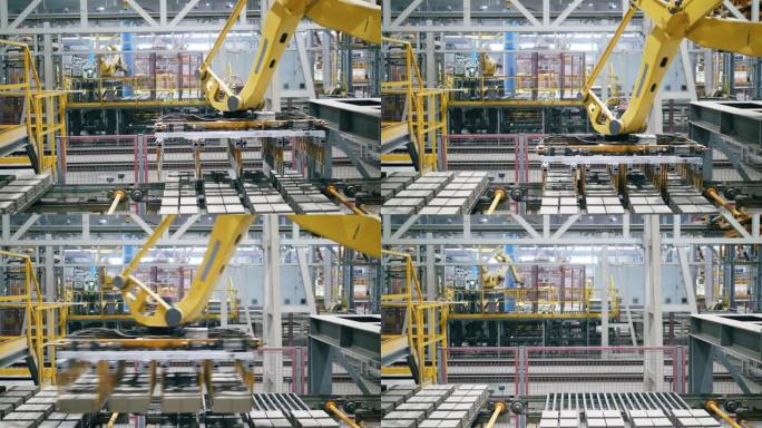 自动化的机器人机器从工作输送机上移动砖块。