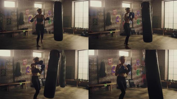 健身运动女性跆拳道运动员在阁楼健身房用激励海报锻炼时拳打脚踢。经过激烈的自卫训练，她筋疲力尽。温暖的