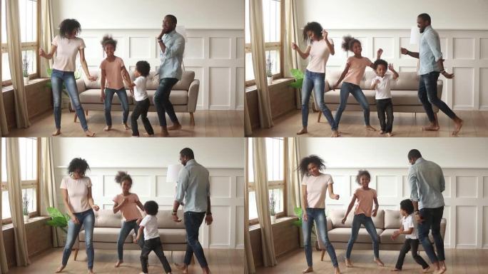 非洲夫妇小孩活跃地在家里跳舞