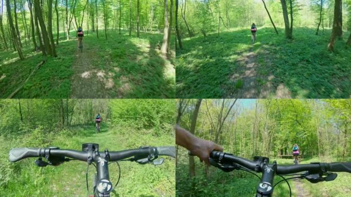 MS个人观点夫妇在树林中的山路上骑自行车