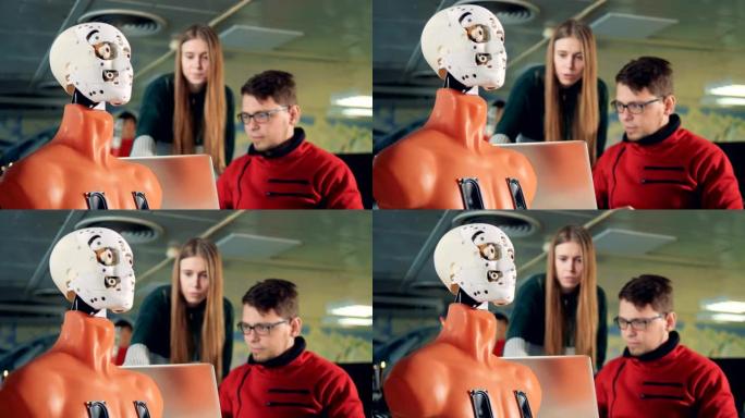 男性和女性专家通过计算机使机器人眨眼