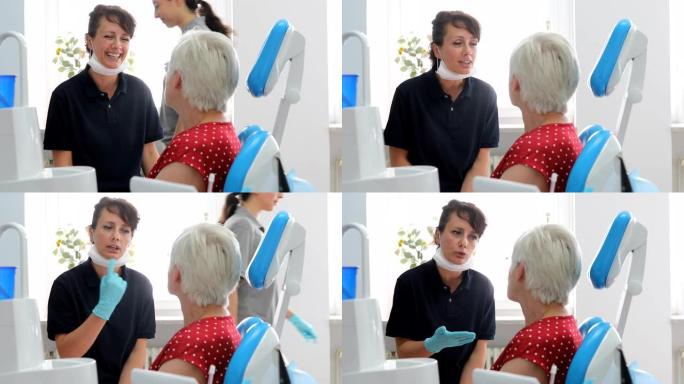 友好的牙医在诊所与女性患者交谈