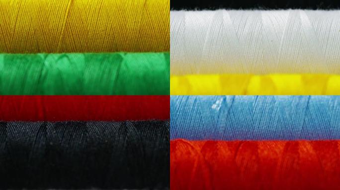 用缝纫线织物拍摄彩色卷的宏观照片。卷有各种颜色和色调，有缝纫针和线各种假发。