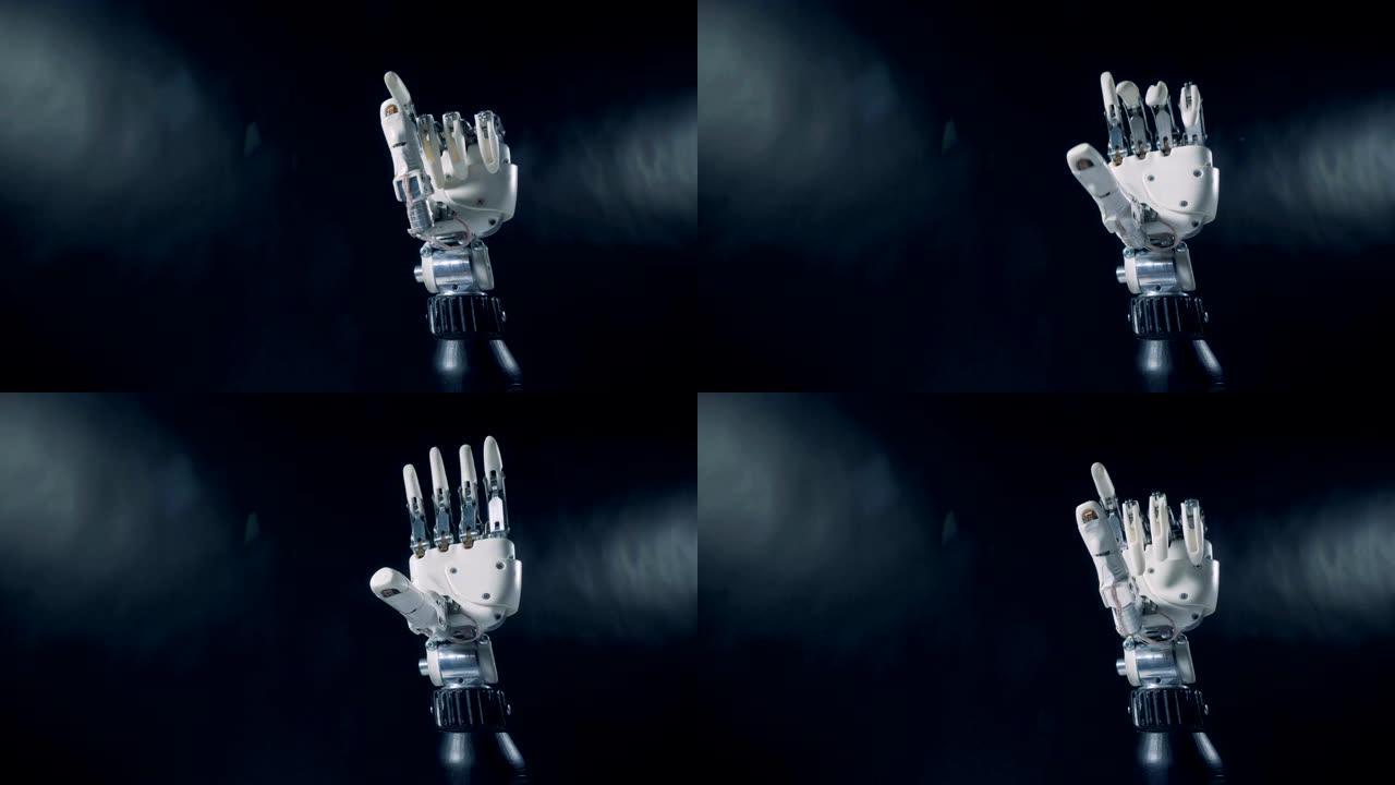 电子手弯曲手指。未来主义半机械人手臂概念。