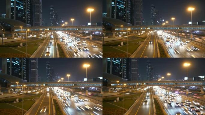 夜间交通的现代照明多车道公路系统的航拍