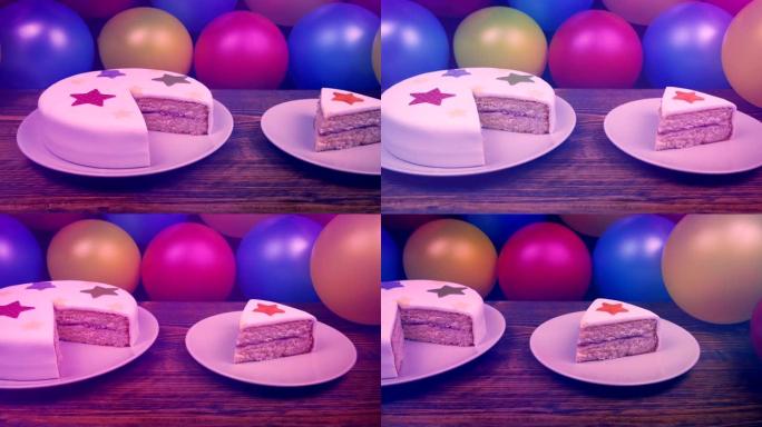 在五颜六色的生日聚会上蛋糕和切片