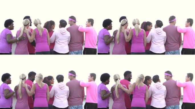 穿着粉色衣服的男人和女人站在一起