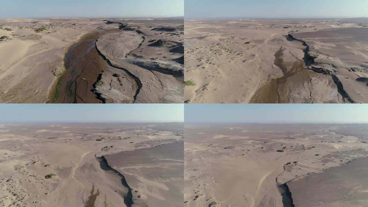 纳米比亚骷髅海岸纳米布沙漠的萨鲁萨之春绿洲的4k空中飞行