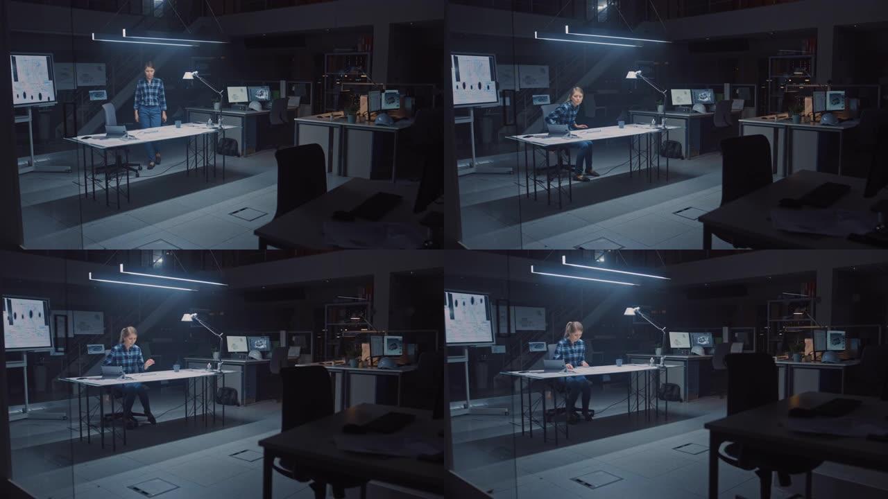 女工程师进入办公室，坐在办公桌前，桌子上放着蓝图，使用铅笔，尺子和数字平板电脑，喝咖啡。在黑暗的工业