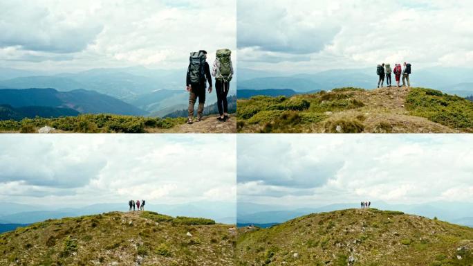 四人站在山上，景色优美