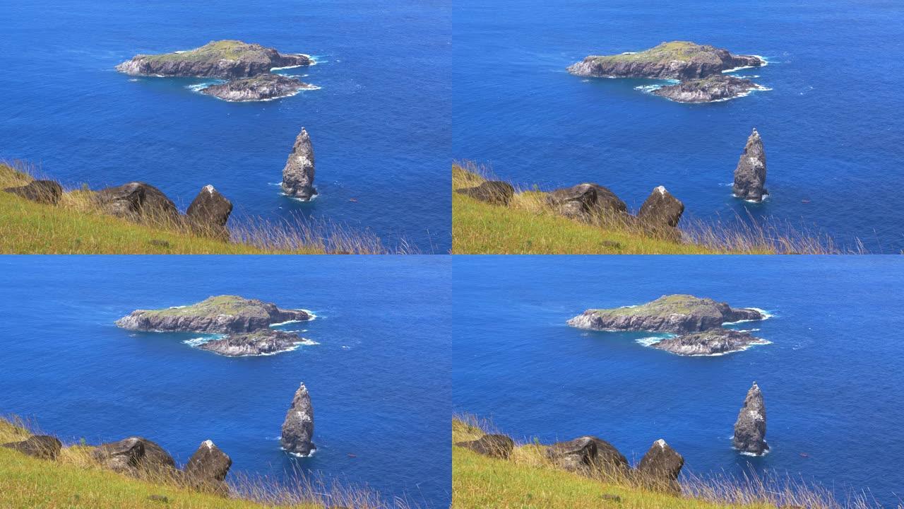 特写: Motu Nui的未触及的小岛被鲜艳的蓝色海洋包围。