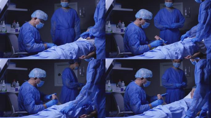 外科医生进行手术做手术室病床抢救医生专注
