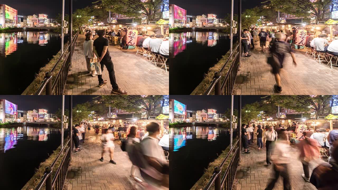 延时: 日本小吃摊Yatai Naka River Hakata fuoka的游客人群