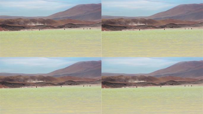 智利阿塔卡马沙漠,阿瓜斯卡连特斯盐都有红石的游客。